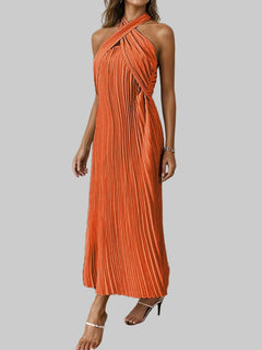 Orange pleated halter neck midi dress with tied detail and no stretch, made from 100% polyester.