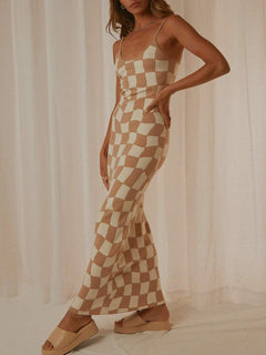 Spaghetti Strap Maxi Sweater Dress in checkered pattern with elegant, flowing silhouette and delicate straps.