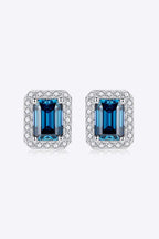 2 carat indigo moissanite stud earrings in geometric sterling silver with platinum plating