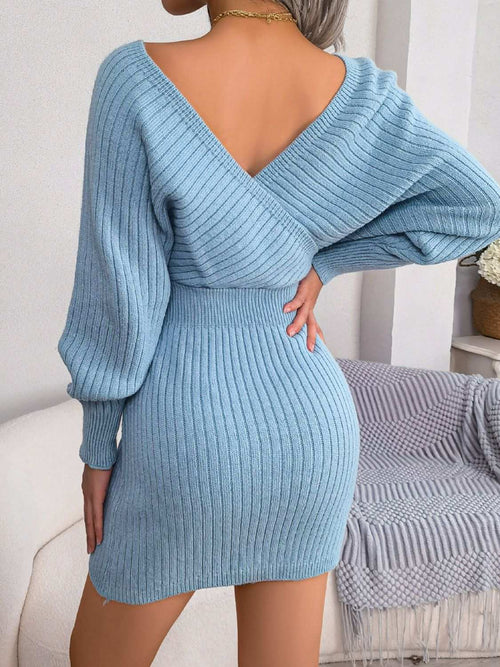 Blue rib-knit dolman sleeve mini sweater dress with surplice neckline and long sleeves