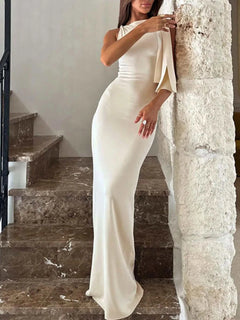Elegant white asymmetrical tied sleeveless maxi dress with a fitted silhouette and floor-length hem