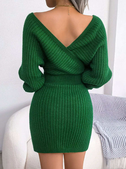 Green rib-knit dolman sleeve sweater dress with surplice neckline and A-line mini hem.