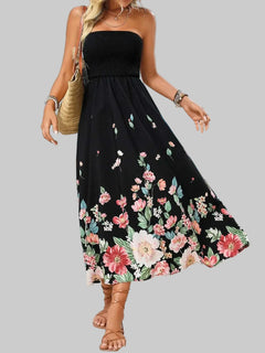 Printed tube midi dress with floral pattern, beach background.