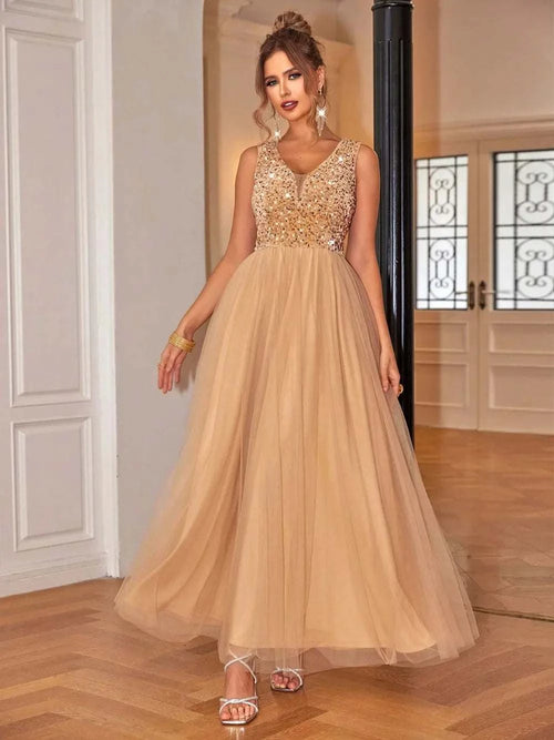 Sequin V-neck sleeveless dress with lined polyamide material.