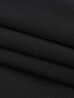 Close-up of black polyester fabric texture for asymmetrical tied sleeveless maxi dress