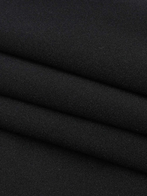 Close-up of black polyester fabric texture for asymmetrical tied sleeveless maxi dress