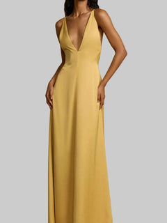 Yellow backless deep V-neck maxi dress with crisscross straps and slightly stretchy polyester fabric