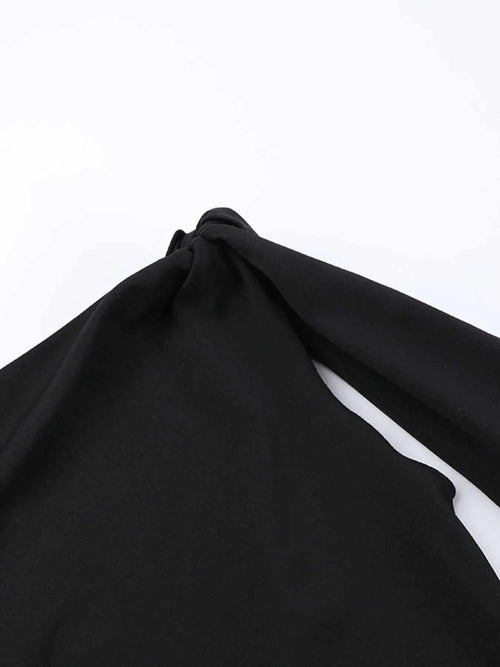 Black asymmetrical tied sleeveless maxi dress made of 100% polyester with no stretch and machine washable fabric.