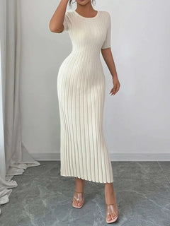 White ribbed round neck short sleeve sweater dress with moderate stretch, made of 100% viscose, styled in a fitted silhouette.