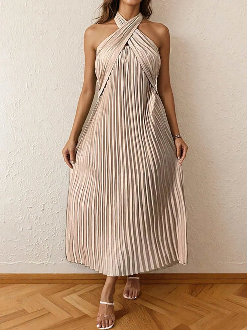 Beige pleated halter neck midi dress with tied neckline and no stretch, made of 100% polyester.