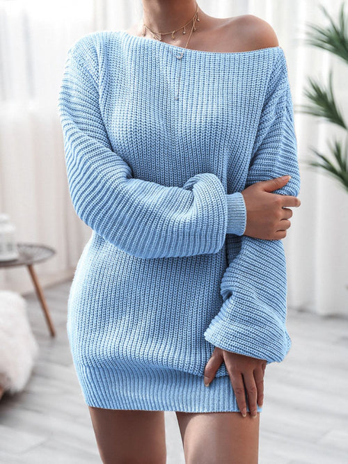 Light blue rib-knit mini sweater dress with long sleeves and off-shoulder design, shown on a model in a bright indoor setting