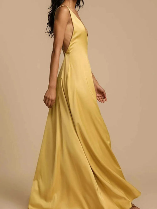 Yellow deep V-neck maxi dress with a backless crisscross design and slightly stretchy polyester fabric