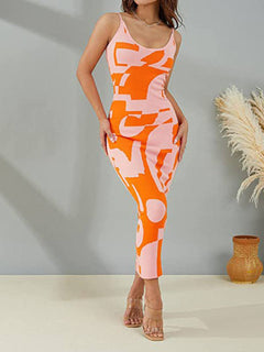 Spaghetti Strap Maxi Sweater Dress in abstract orange and pink pattern, featuring a figure-hugging silhouette.