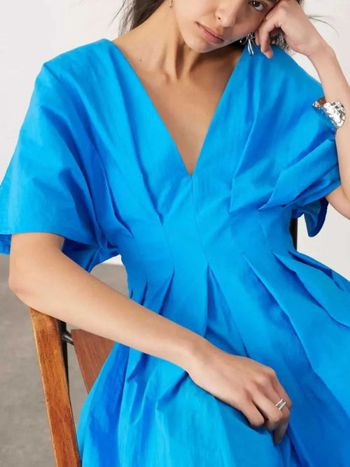 Blue V-neck half sleeve midi dress with ruched detailing and backless design