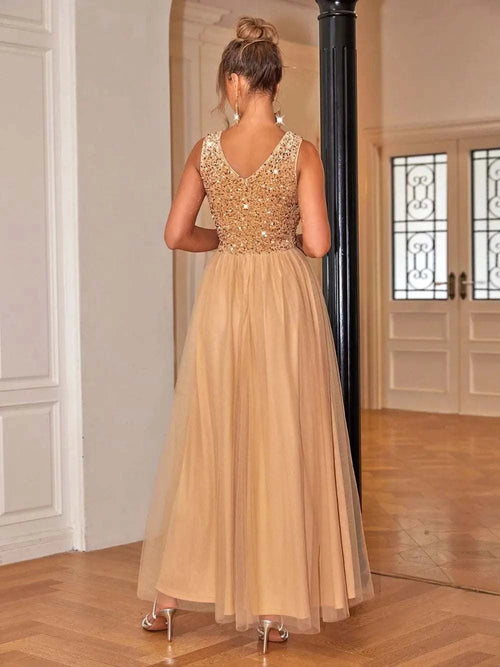 Sequin V-Neck Sleeveless Dress, slightly stretchy and lined, in a luxurious setting.
