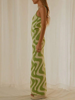 Spaghetti Strap Maxi Sweater Dress in green, featuring a flowing silhouette and spaghetti straps.