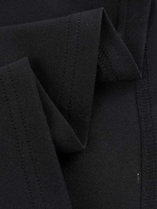 Close-up of black fabric detailing on asymmetrical tied sleeveless maxi dress made of 100% polyester