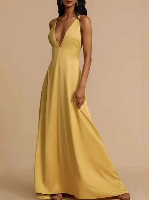 Yellow deep V-neck maxi dress with backless crisscross design and slightly stretchy polyester fabric