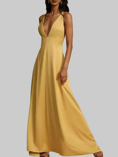 Yellow deep V-neck maxi dress with backless crisscross design and slightly stretchy polyester fabric