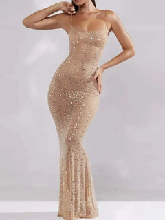 Nude rhinestone spaghetti strap maxi dress with slight stretch and fitted silhouette