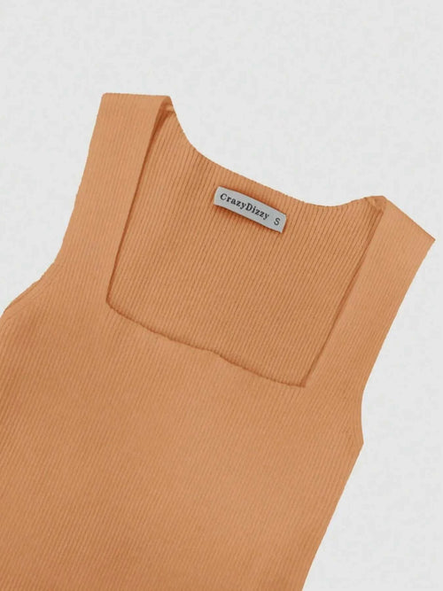 Close-up of ribbed knit bodycon dress in light brown with square neckline and sleeveless design