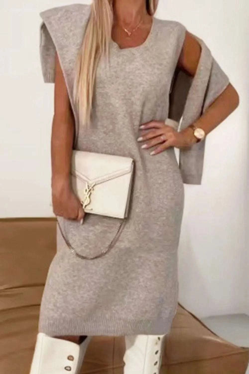 woman wearing beige Turtleneck Dropped Shoulder sweater dress set with matching sweater and white boots holding white clutch bag