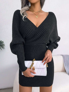Black rib-knit dolman sleeve mini sweater dress with surplice neckline and A-line hem, casual style