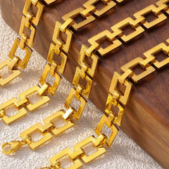 Gold-plated titanium steel chain bracelet with hollow square links and polished finish