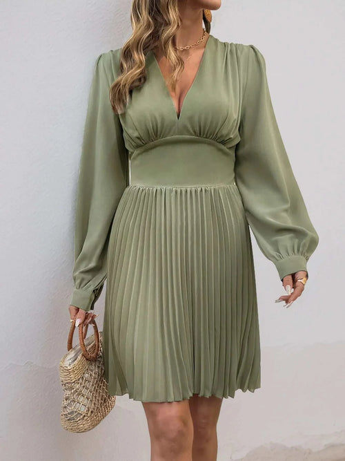 Olive green pleated long sleeve V-neck dress with slightly stretchy polyester fabric and zipper detail