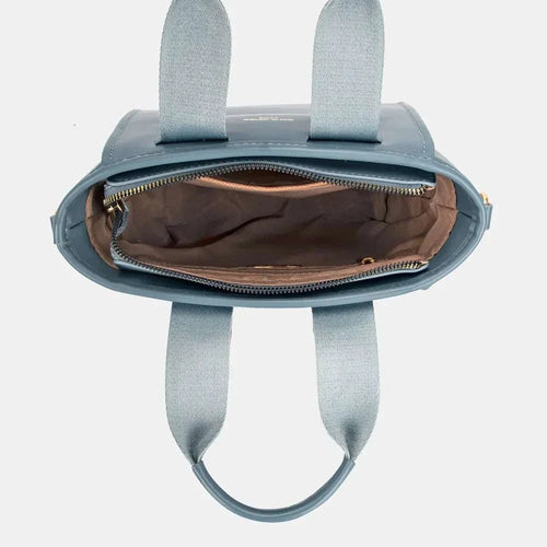 David Jones Small Handbag with Embossed Pattern Handles in blue, top view displaying interior storage and zipper.