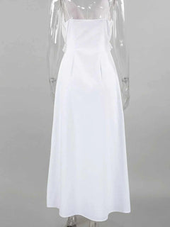 White ruffled V-neck maxi dress made of 100% cotton with a lined body and frill detail