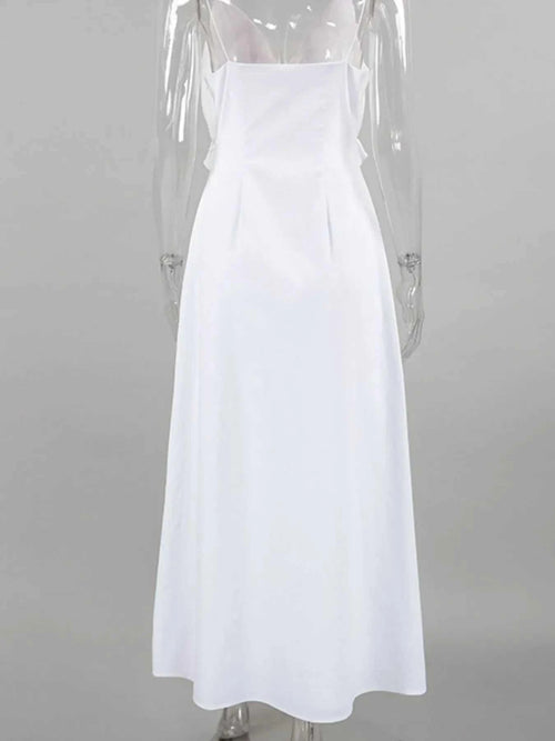White ruffled V-neck maxi dress made of 100% cotton with a lined body and frill detail