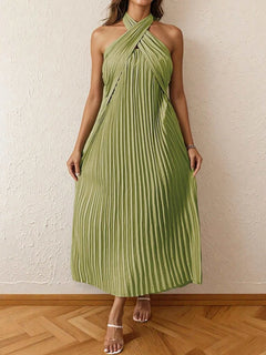 Green pleated halter neck midi dress with tied neckline and no stretch polyester fabric.