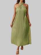 Green pleated halter neck midi dress with tied neckline and no stretch polyester fabric.