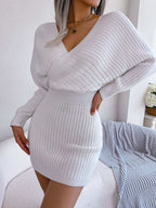 White rib-knit dolman sleeve sweater dress with surplice neckline and A-line mini hem