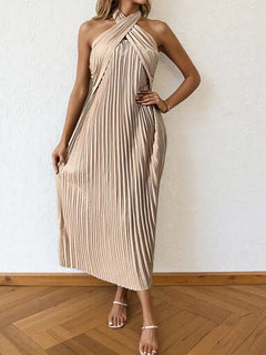 Beige pleated halter neck midi dress with tied detail and sleeveless design
