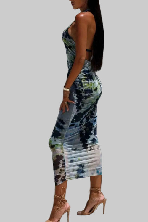 Backless printed halter neck dress, polyester, side view.