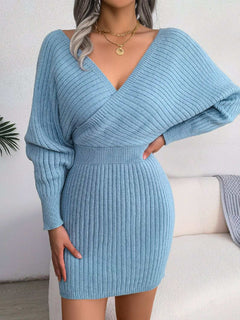 Blue rib-knit dolman sleeve sweater dress with surplice neckline and A-line mini hem.