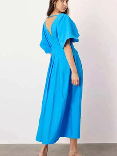 Blue V-neck half sleeve midi dress with ruched backless design and no stretch polyester fabric