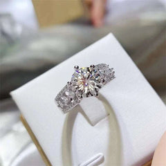 3 carat moissanite ring with platinum-plated 925 sterling silver band and zircon accent stones in a gift box