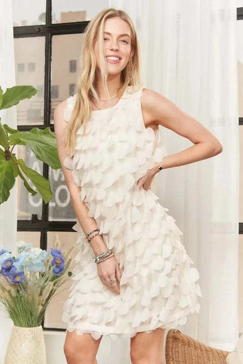 ADORA Sleeveless Shift 3D Petal Dress with floral details.