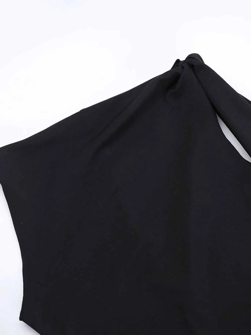Black asymmetrical tied sleeveless maxi dress made of 100% polyester with no stretch and unlined body.