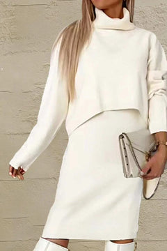 Woman wearing a white turtleneck dropped shoulder sweater and matching dress sweater set with moderate stretch and basic style