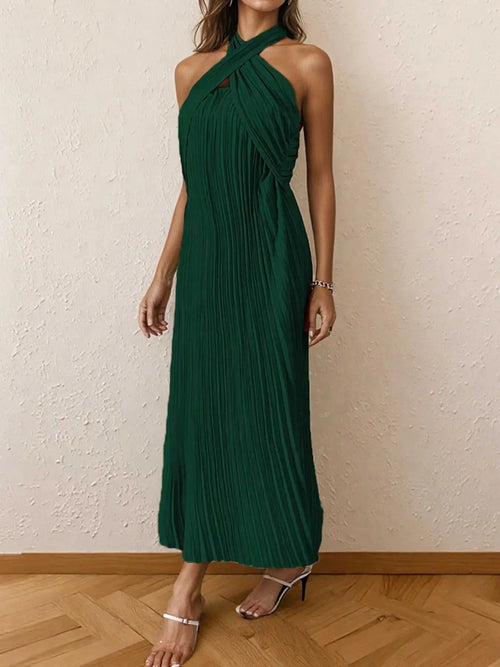 Green pleated halter neck midi dress with tied detail and no stretch, made of 100% polyester.