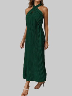 Green pleated halter neck midi dress with tied detail and no stretch, made of 100% polyester.