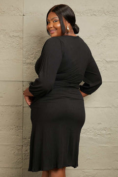 Plus size black Culture Code full size surplice flare midi dress with ruched long sleeves and waist tie detail