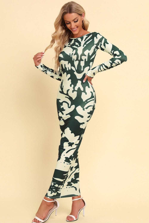 Printed backless long sleeve maxi dress with camouflage pattern and round neck.