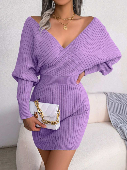 Purple rib-knit dolman sleeve sweater dress with surplice neckline and A-line hem, casual mini length.