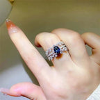 1 carat moissanite 925 sterling silver ring set with zircon and blue gemstone on finger