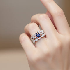 1 carat moissanite 925 sterling silver ring set with zircon and blue gemstone on finger